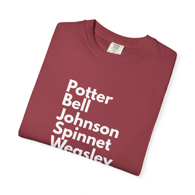 Folded maroon t-shirt with white text on a white background