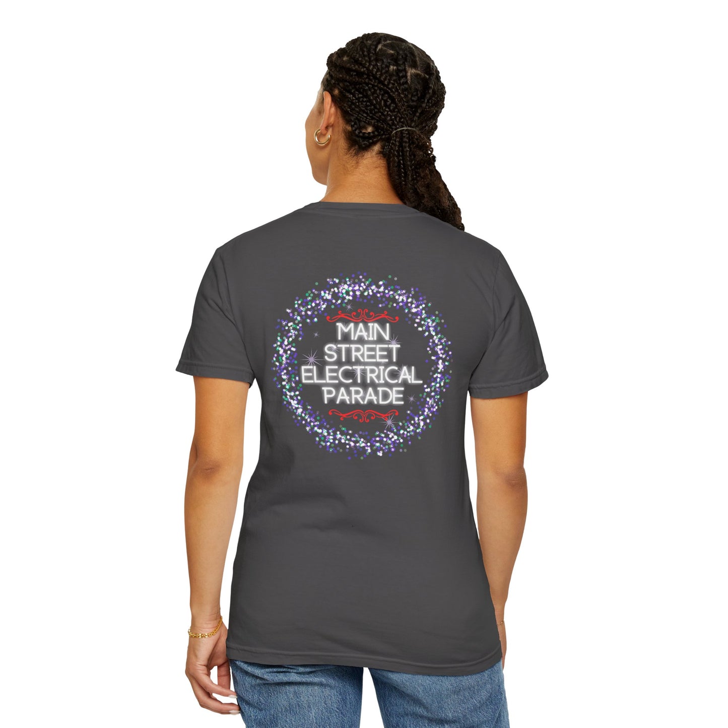 Person wearing a dark gray t-shirt with 'Main Street Electrical Parade' design on the back, on a white background.