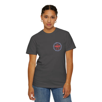 Person wearing a dark gray t-shirt with a logo on a white background