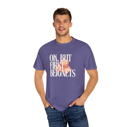 Man wearing a purple t-shirt with text and a graphic on a white background