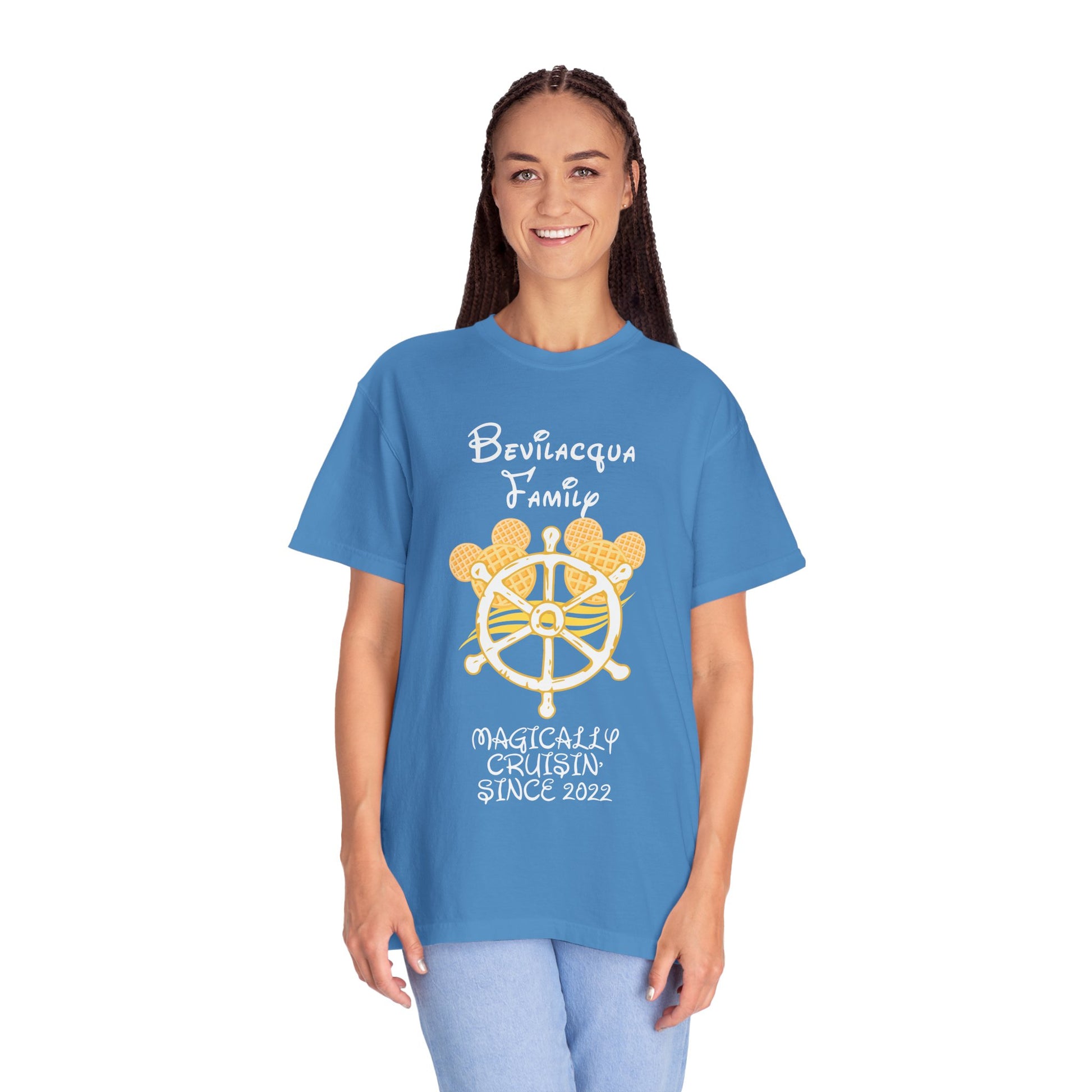 Woman wearing a blue t-shirt with a ship's wheel graphic and text on a white background