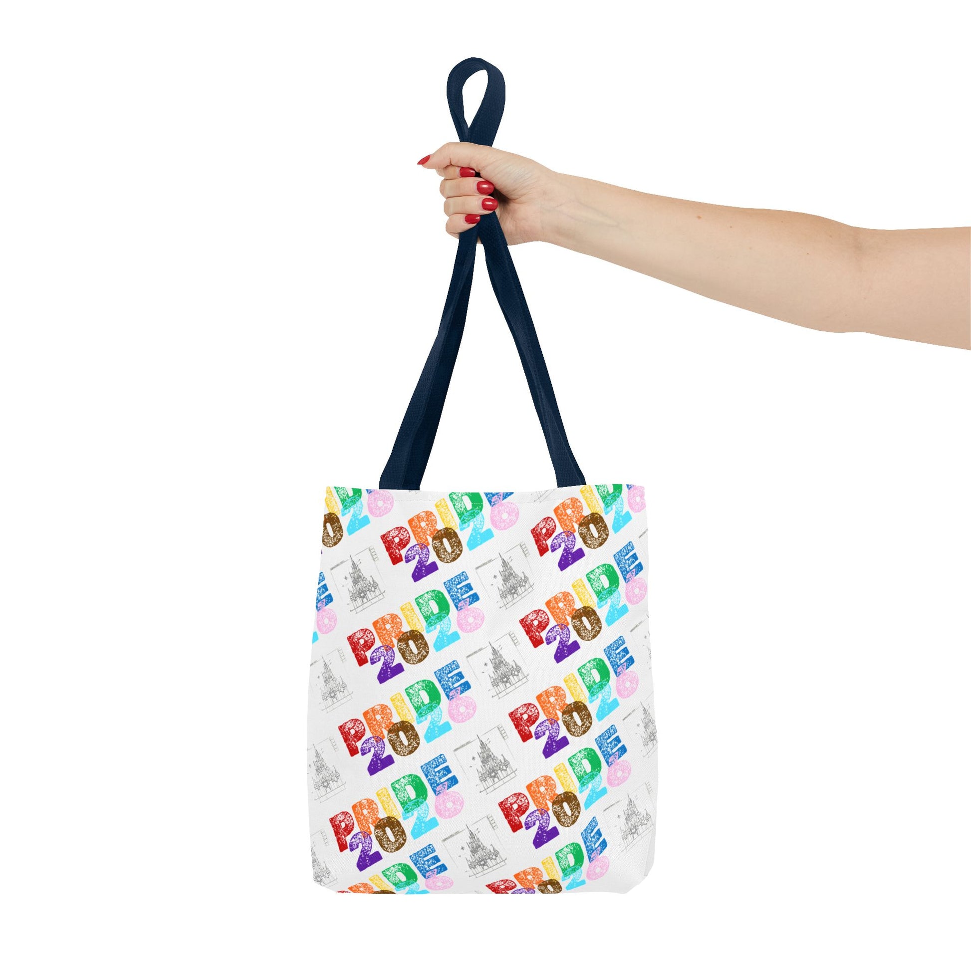 Tote bag with 'Pride 2026' pattern held by a hand on a white background