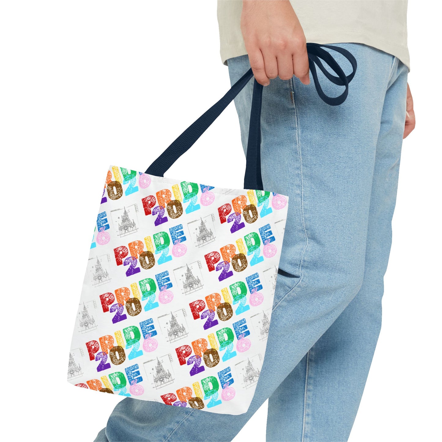 Tote bag with 'Pride 2026' text held by a person wearing jeans.