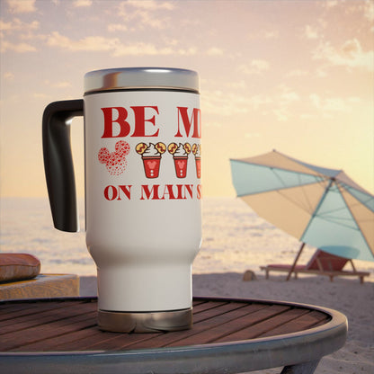 Travel mug with 'Be Mine on Main Street' text on a beach setting with disney icons