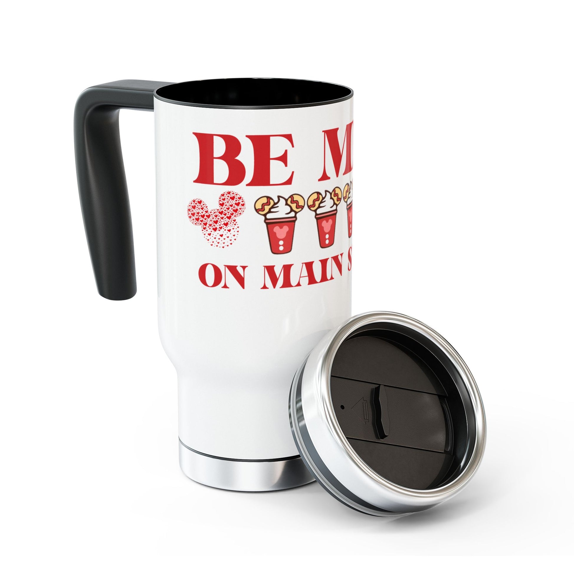 White travel mug with red text and black handle on a white background