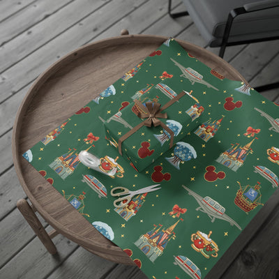 Gift box on a green patterned surface with a wooden tray underneath