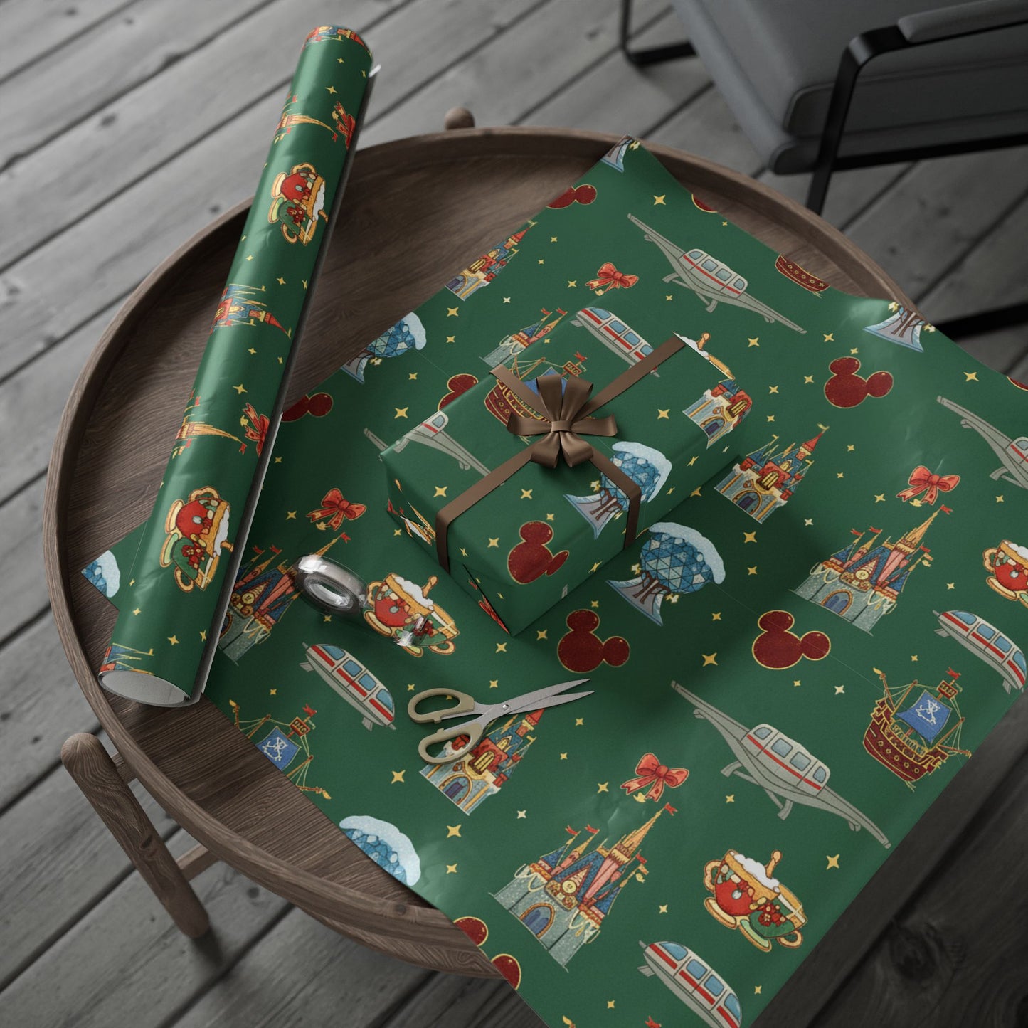 Green wrapping paper with colorful designs on a wooden table