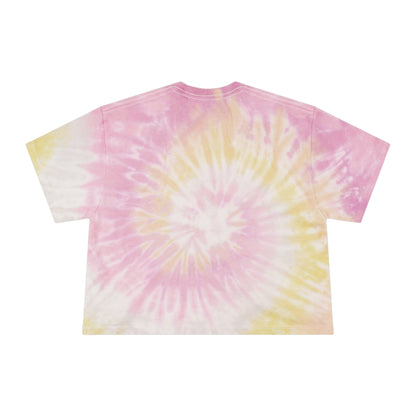 Tie-dye t-shirt with pink and yellow spiral pattern on a white background