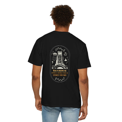 Person wearing a black t-shirt with a graphic design on the back, standing against a white background