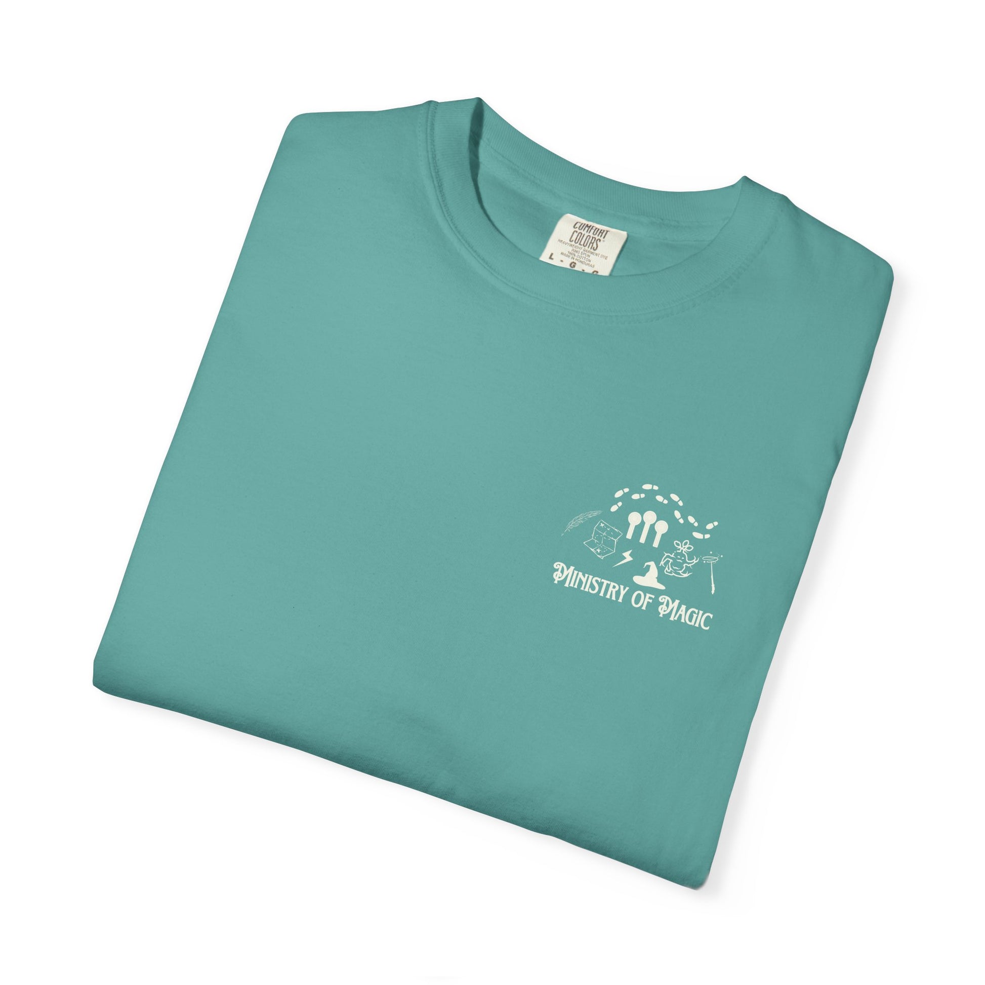 Folded teal t-shirt with a white graphic and text on a white background