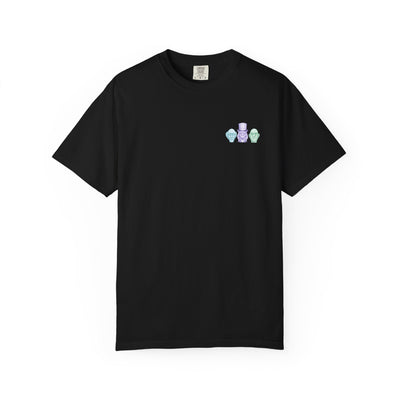 Black t-shirt with small colorful graphic on a white background