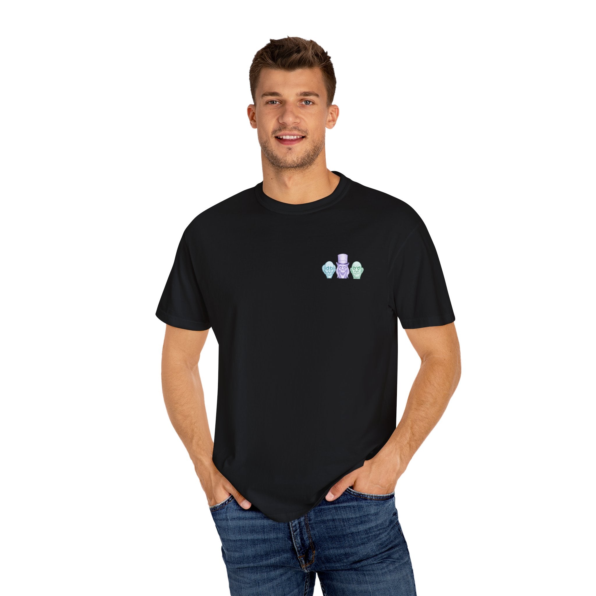 Man wearing a black t-shirt with a small logo on a white background