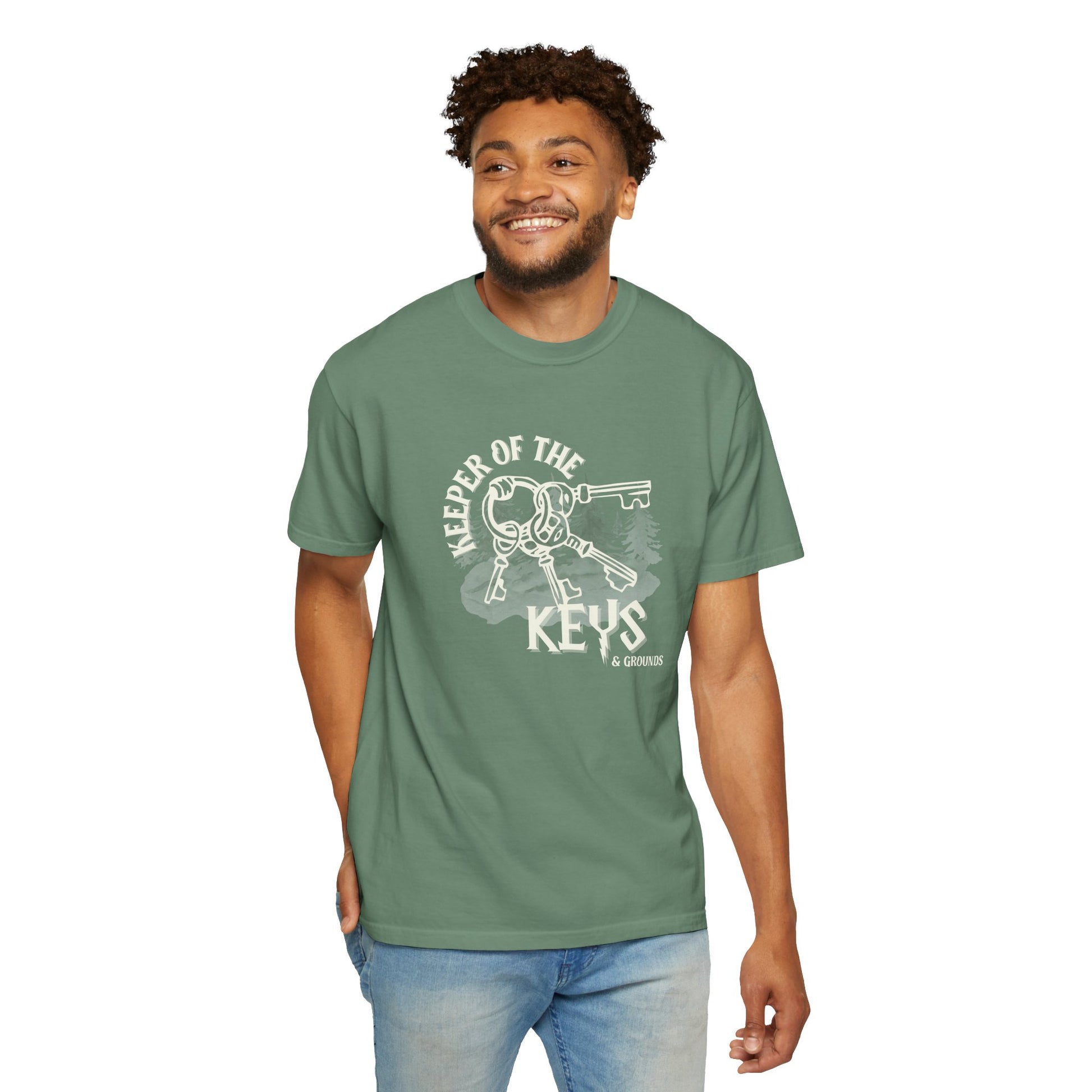 Man wearing a green t-shirt with a graphic design on a white background