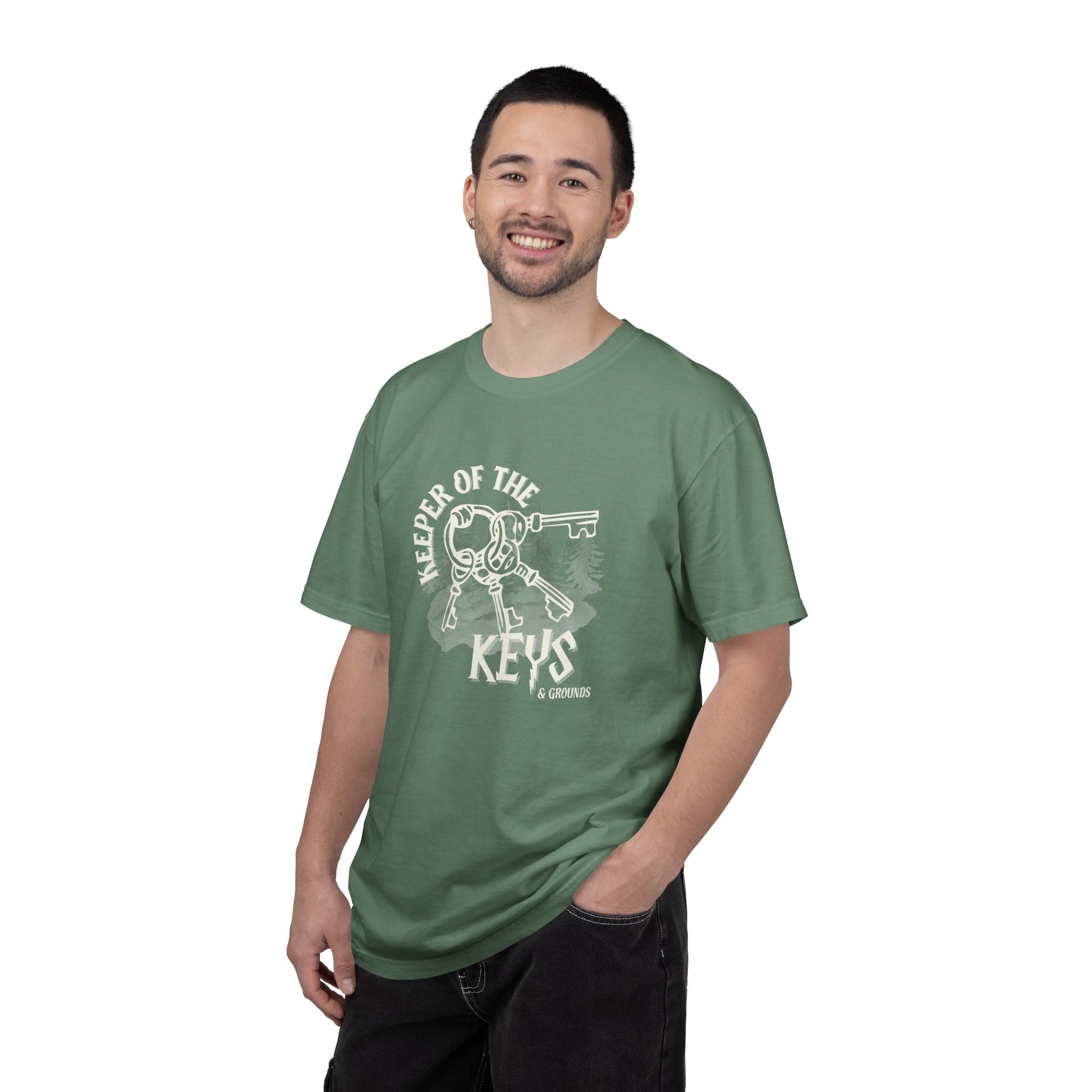 Man wearing a green t-shirt with a graphic design on a white background