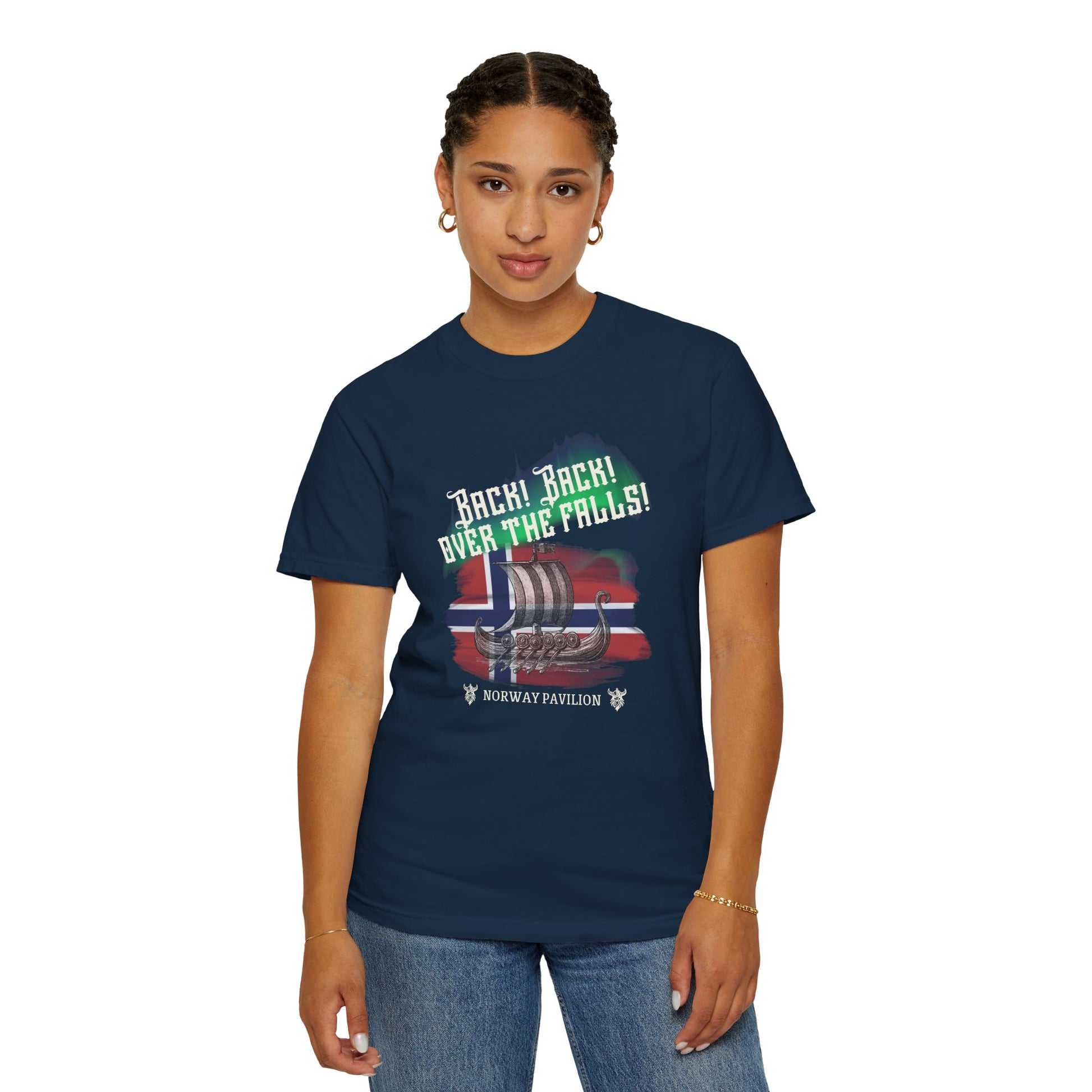 Person wearing a navy blue t-shirt with a graphic design on a white background