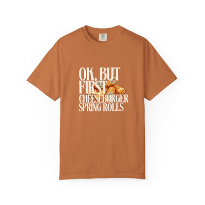 Brown t-shirt with white text and graphic on a white background
