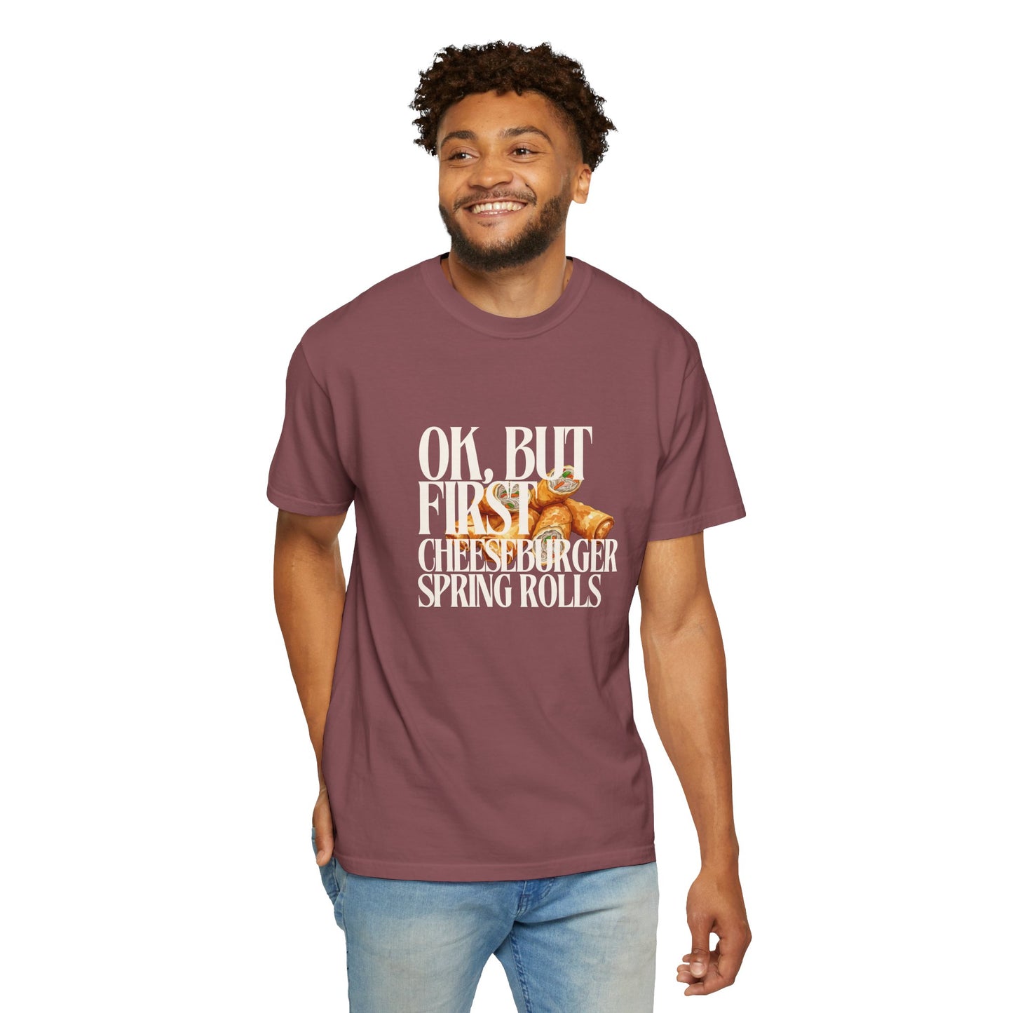 Man wearing a maroon t-shirt with a humorous graphic and text on a white background