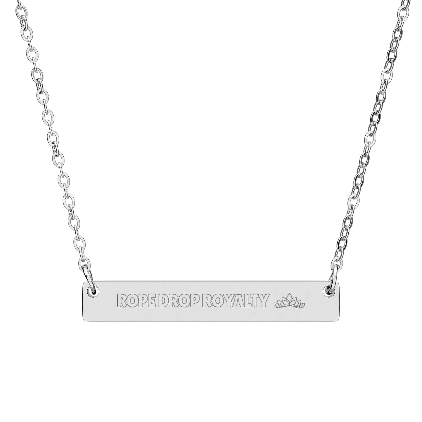 Silver necklace with 'ROPE DROP ROYALTY' pendant on a white background