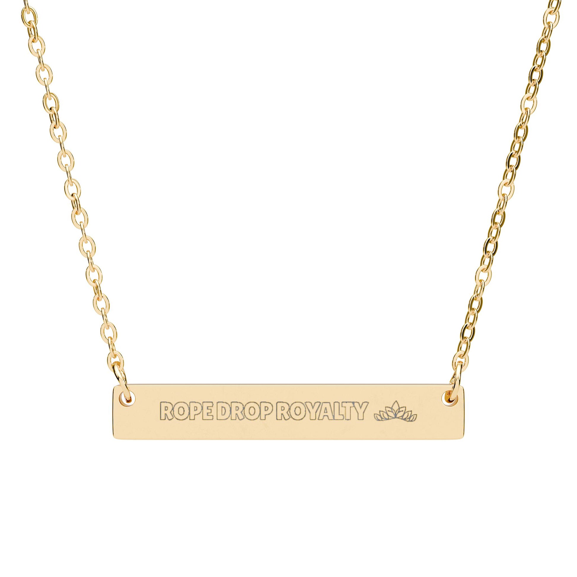 Gold necklace with 'ROPE DROP ROYALTY' pendant on a white background