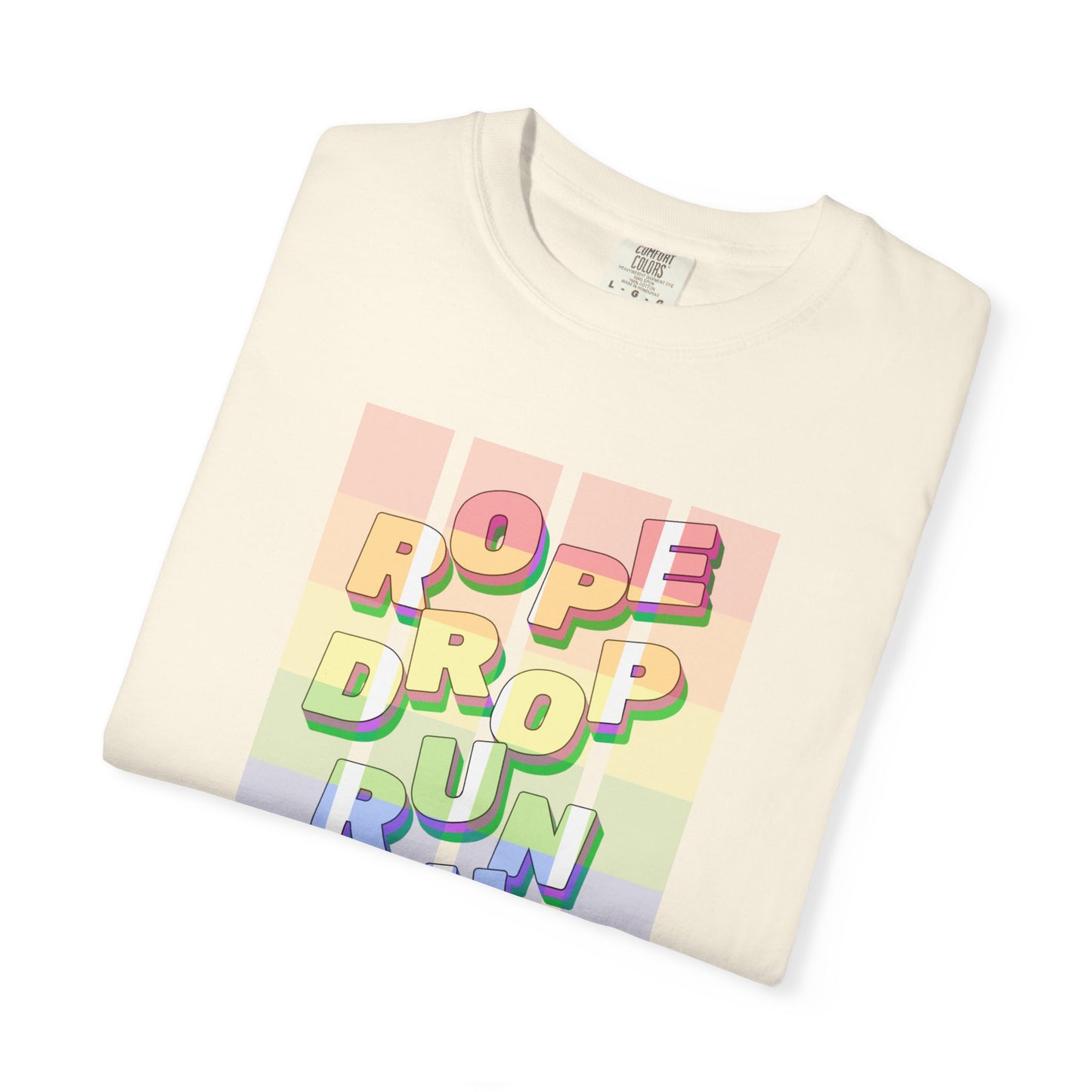 Folded t-shirt with colorful text design on a white background